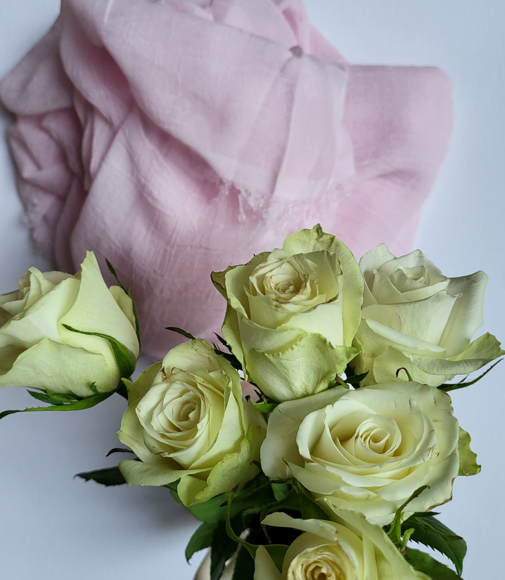 Pink bamboo stole with a soft British rose-inspired hue, showcasing a delicate and elegant design