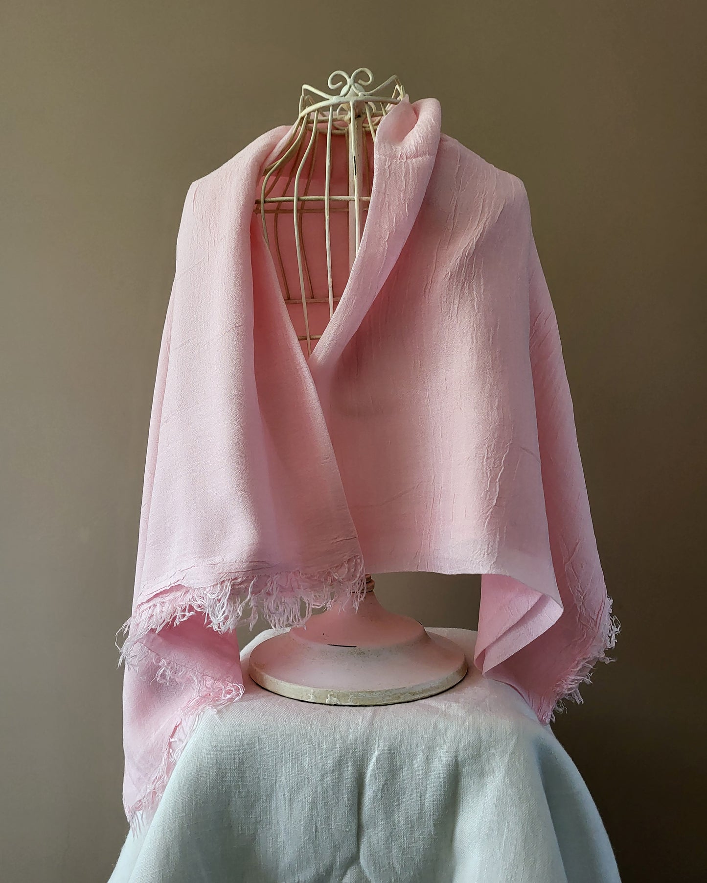 Pink bamboo stole with a soft British rose-inspired hue, showcasing a delicate and elegant design