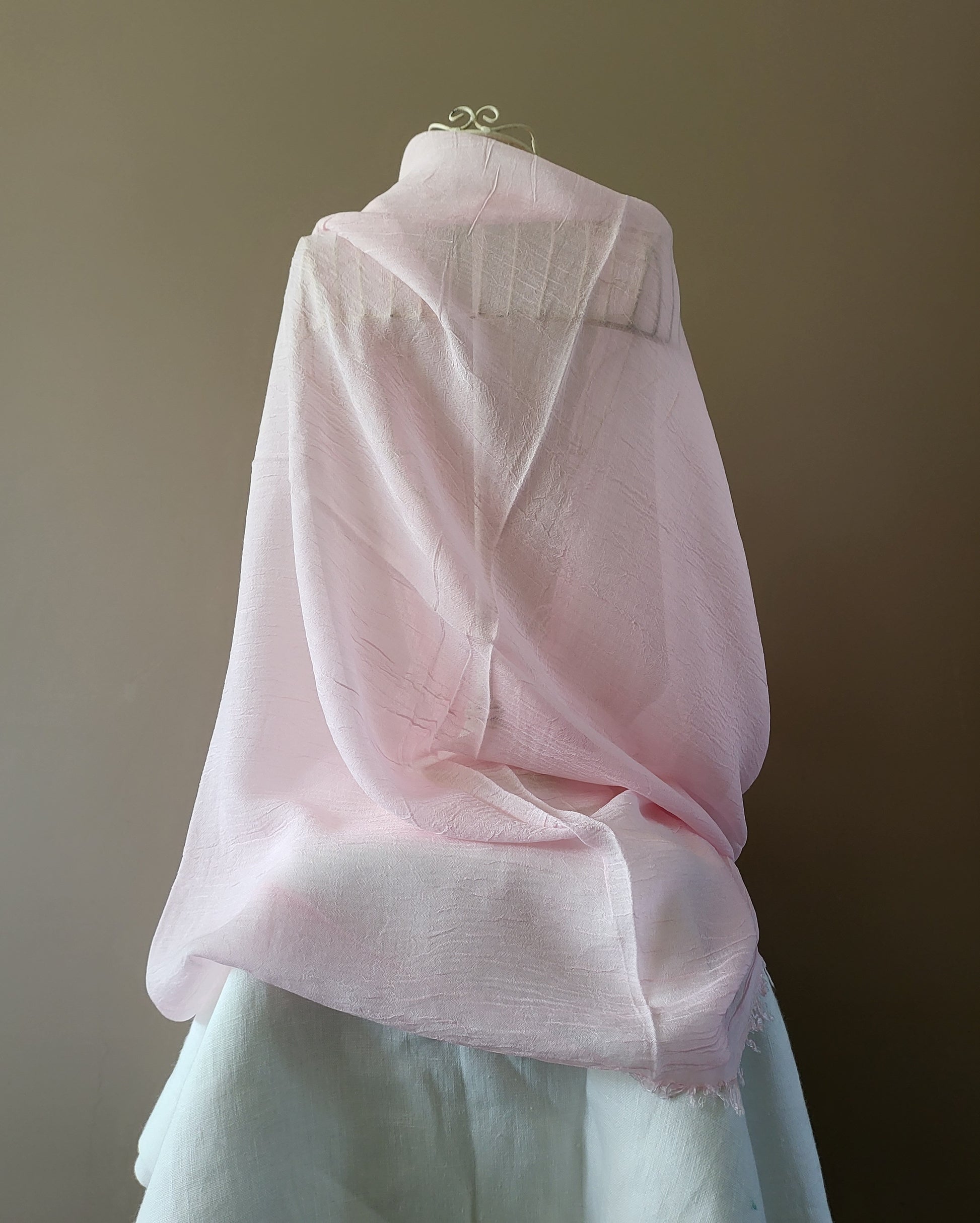 Pink bamboo stole with a soft British rose-inspired hue, showcasing a delicate and elegant design