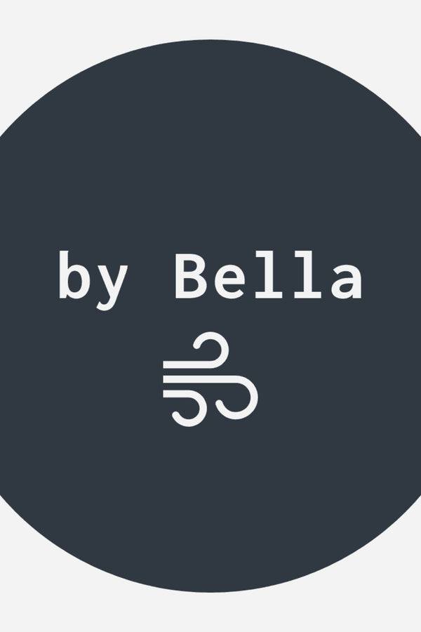 Round by Bella logo dark and white wind blow 